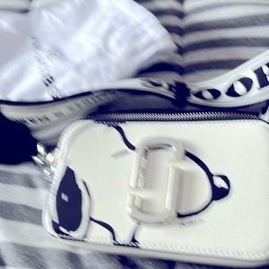 I am selling a Mark Jacubs snoopy purse